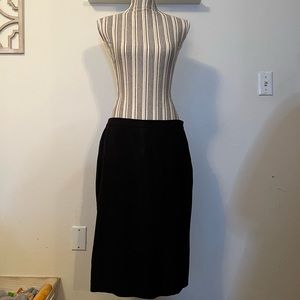 Cute black skirt with double slit in the back. Size 10.❤️